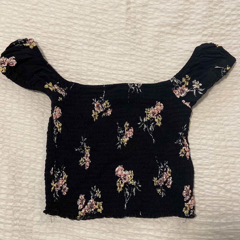 Black crop top with flowers. Off-shoulder. From Garage